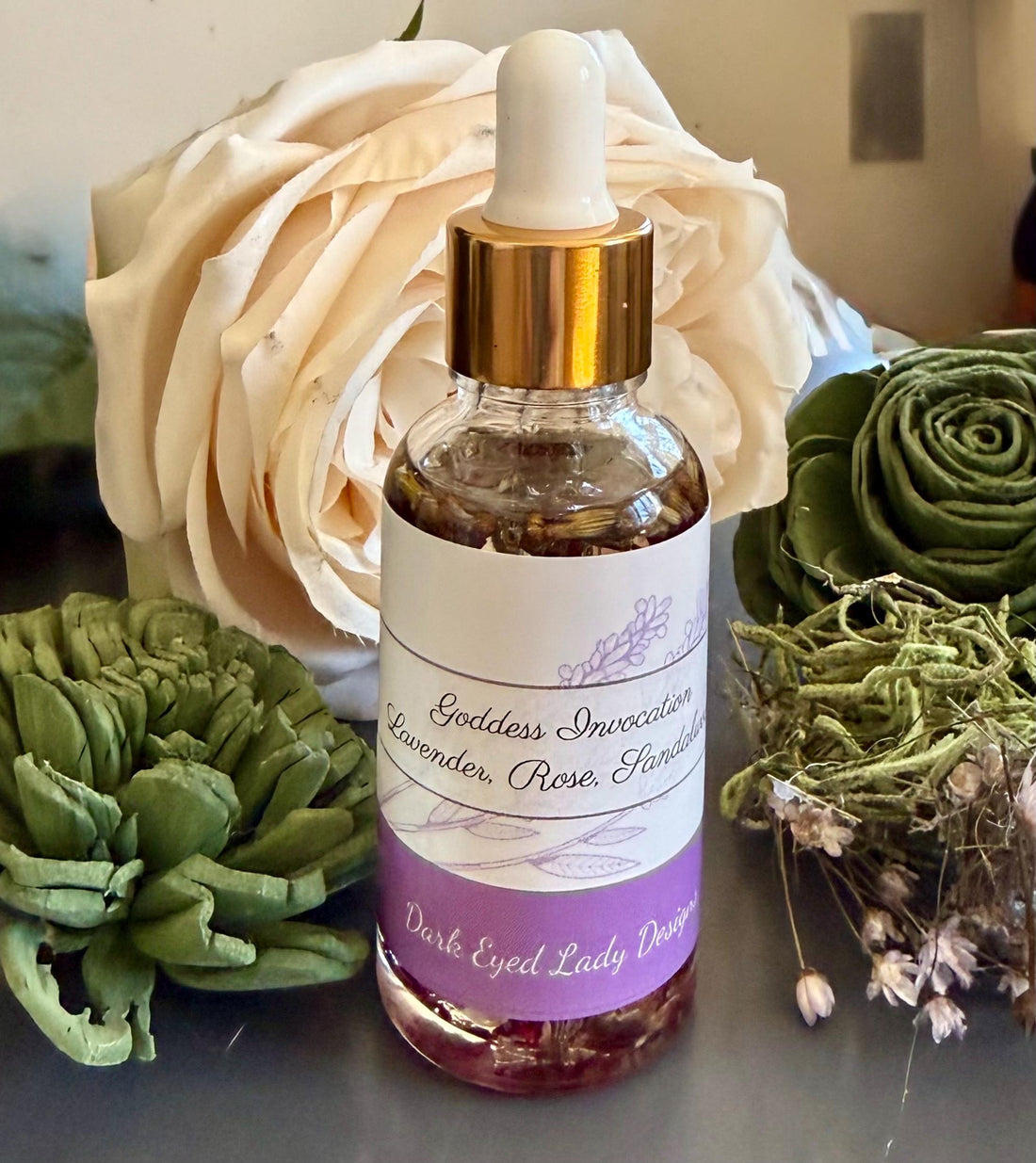Goddess Invocation Ritual Anointing Oil with Essential Oils, Dried Rose and Lavender Petals.