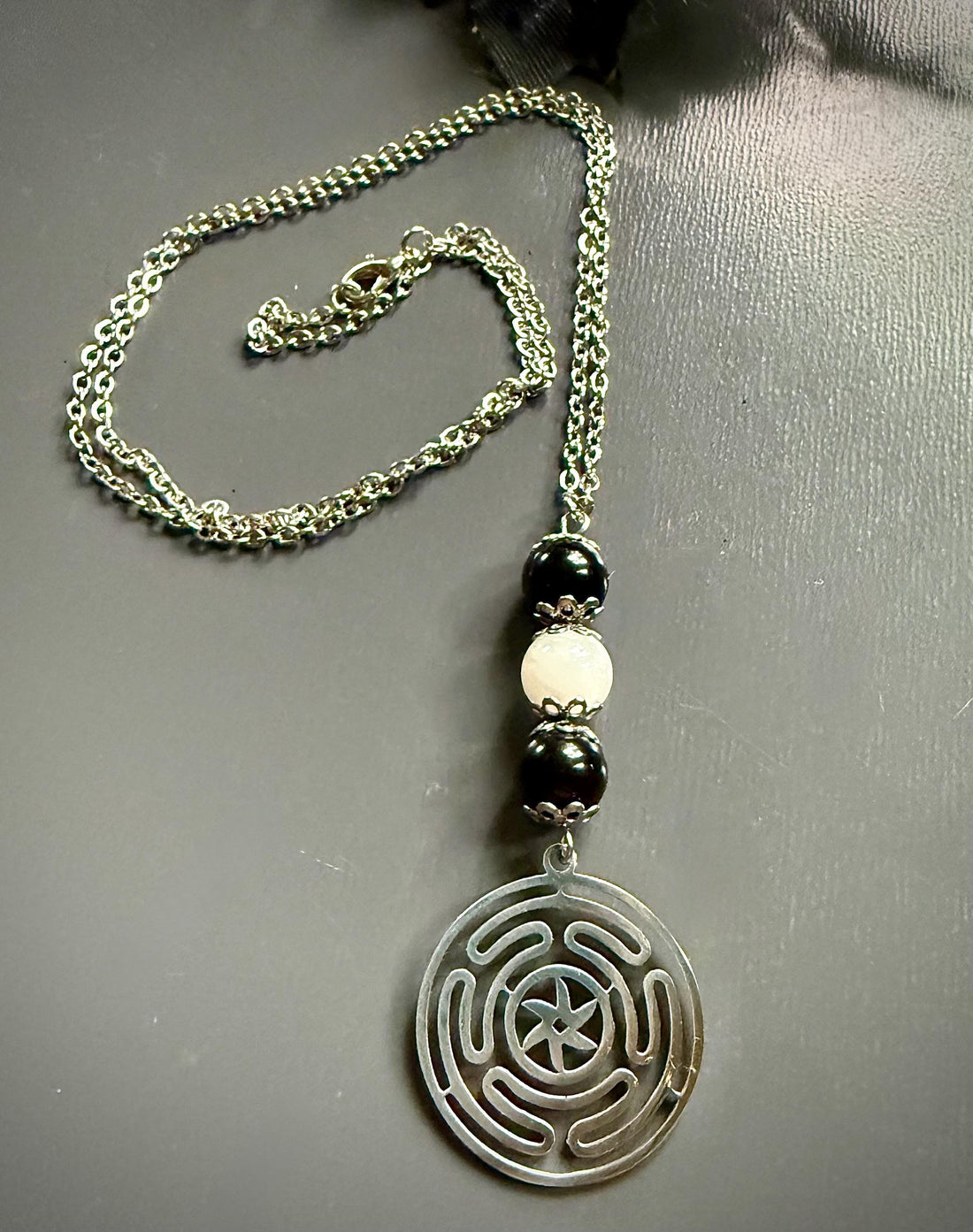 Goddess Hekate’s Wheel Pendant Necklace with Obsidian and Moonstone.