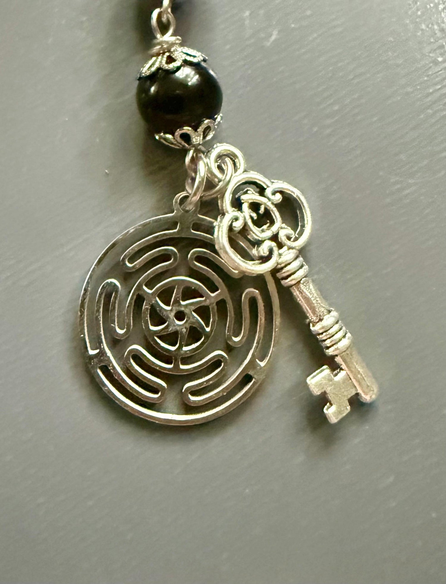 Hekate’s Wheel Prayer and Devotional Beads:  Amethyst, Obsidian, Moonstone, Key, and Goddess Charm.
