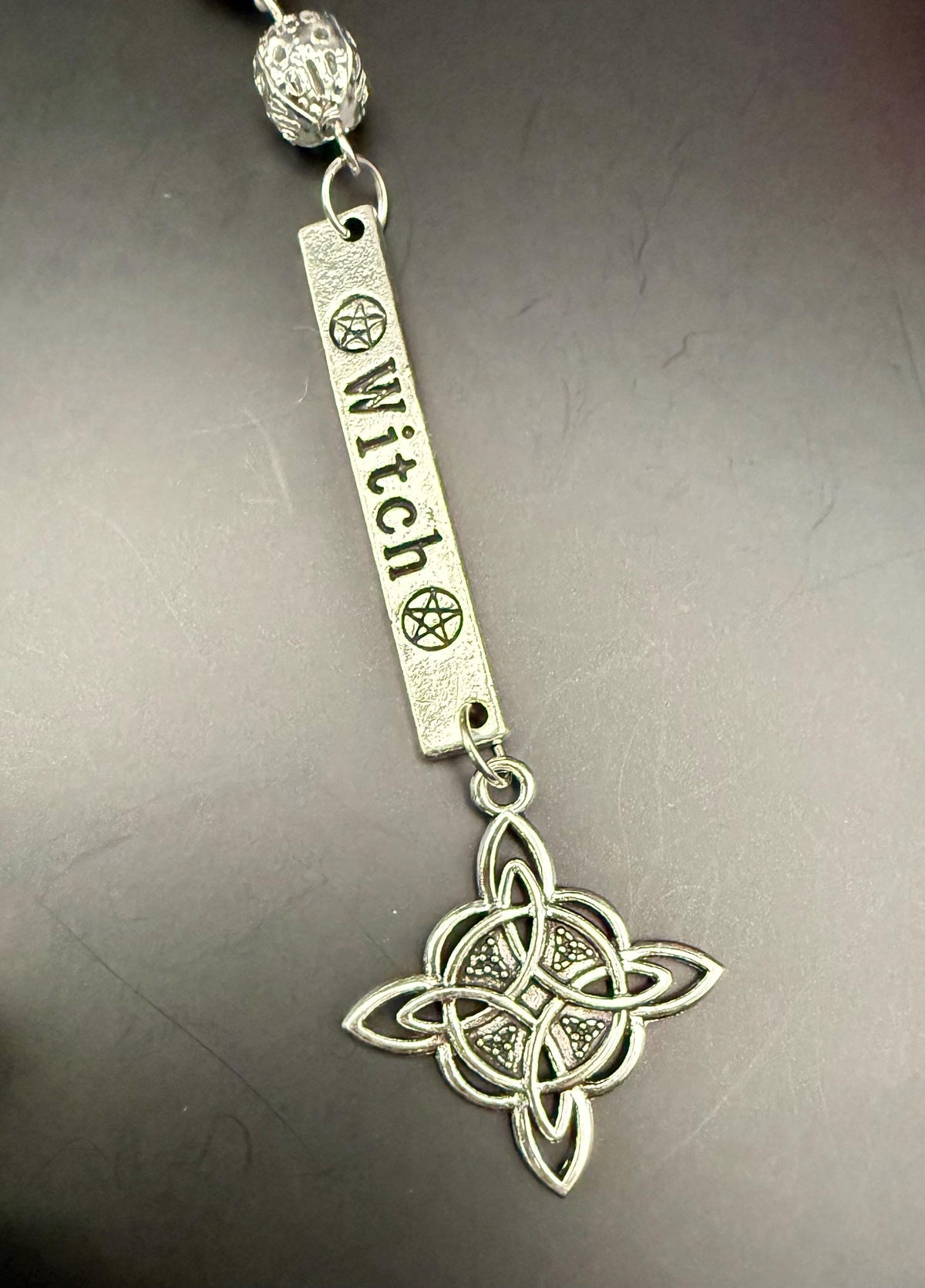 Samhain Pendulum with Tourmaline Point,  Red Brecciated Jasper, Obsidian, and Witch’s Knot Charm.