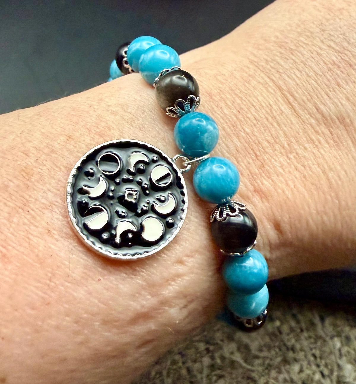 Blue Quartz and Obsidian Beaded Stretch Bracelet with Moon Phases Charm.