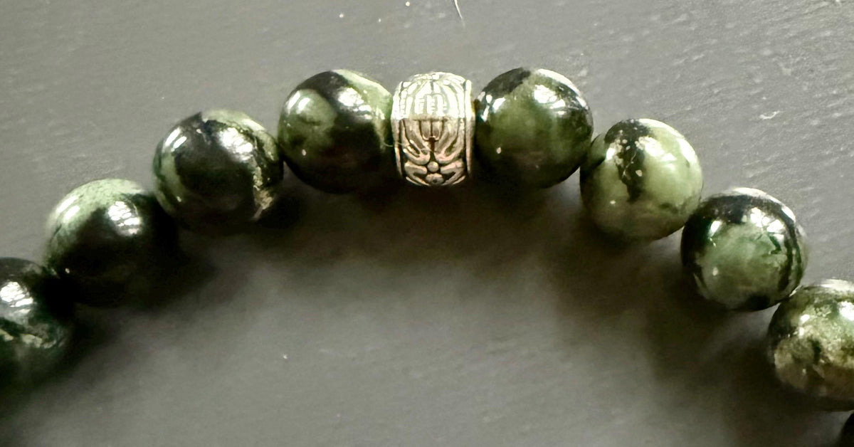 Kambaba Jasper Gemstone Stretch Bracelet with Celtic Knot Charm.