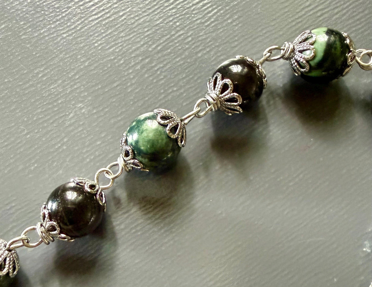 Handmade Kambaba Jasper Point Pendulum with Obsidian Beads.