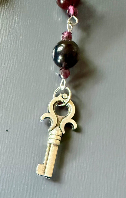 Handmade Garnet Point Pendulum with Obsidian and Garnet Beads.