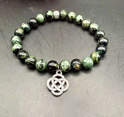 Kambaba Jasper Gemstone Stretch Bracelet with Celtic Knot Charm.