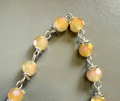 Opalite Handmade Pendulum with Crystal Glass Beads and Witch’s Knot Charm.