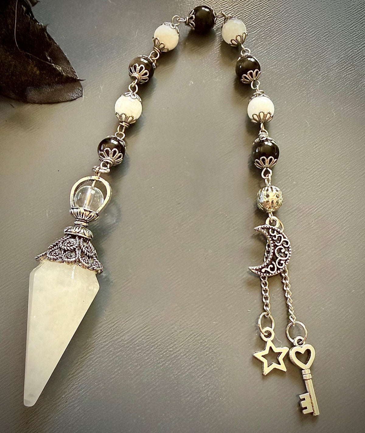 Handmade Quartz Pendulum with Moonstone and Obsidian Beads.