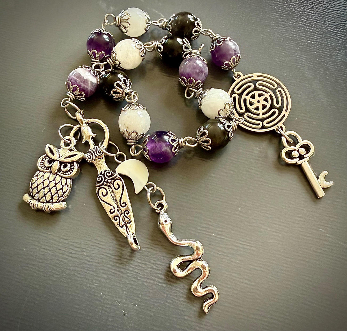 Wheel of Hekate Strophalos Devotional Prayer Beads:  Amethyst, Obsidian, and Moonstone.