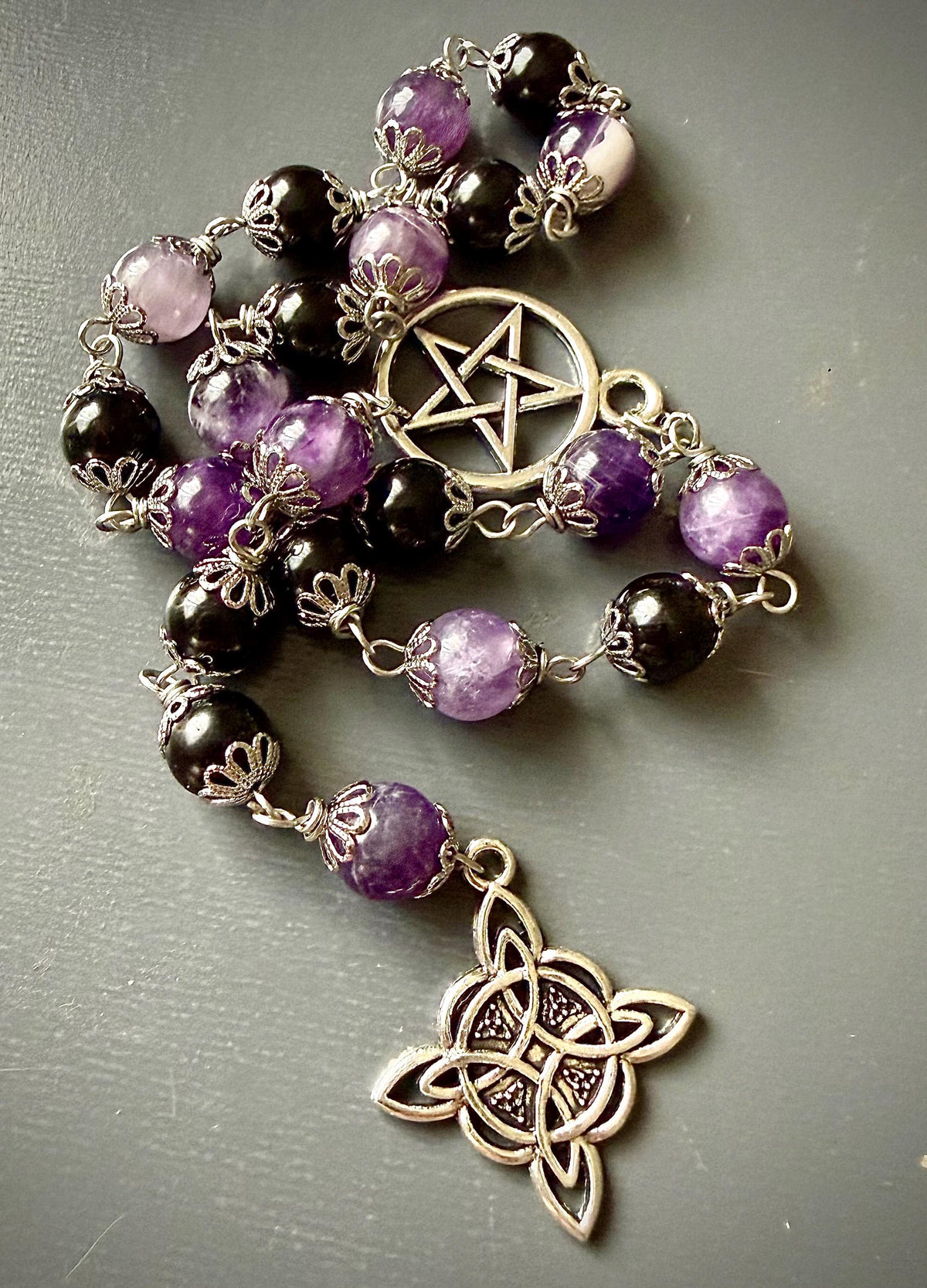 Witch’s Knot Rosary with Amethyst and Tourmaline Gemstones.