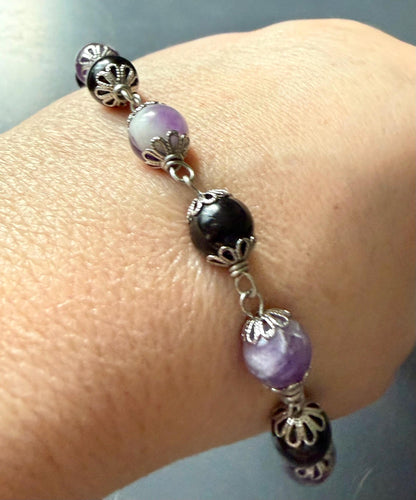 Witch’s Knot Rosary with Amethyst and Tourmaline Gemstones.