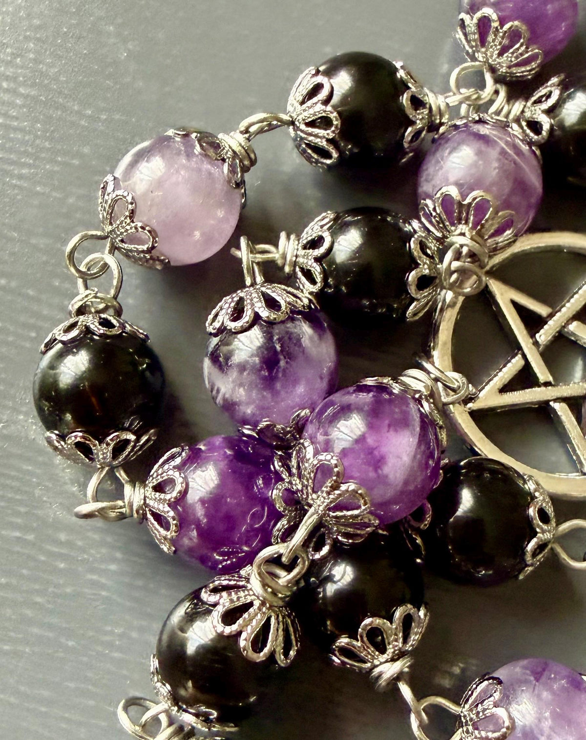 Witch’s Knot Rosary with Amethyst and Black Obsidian Gemstones.