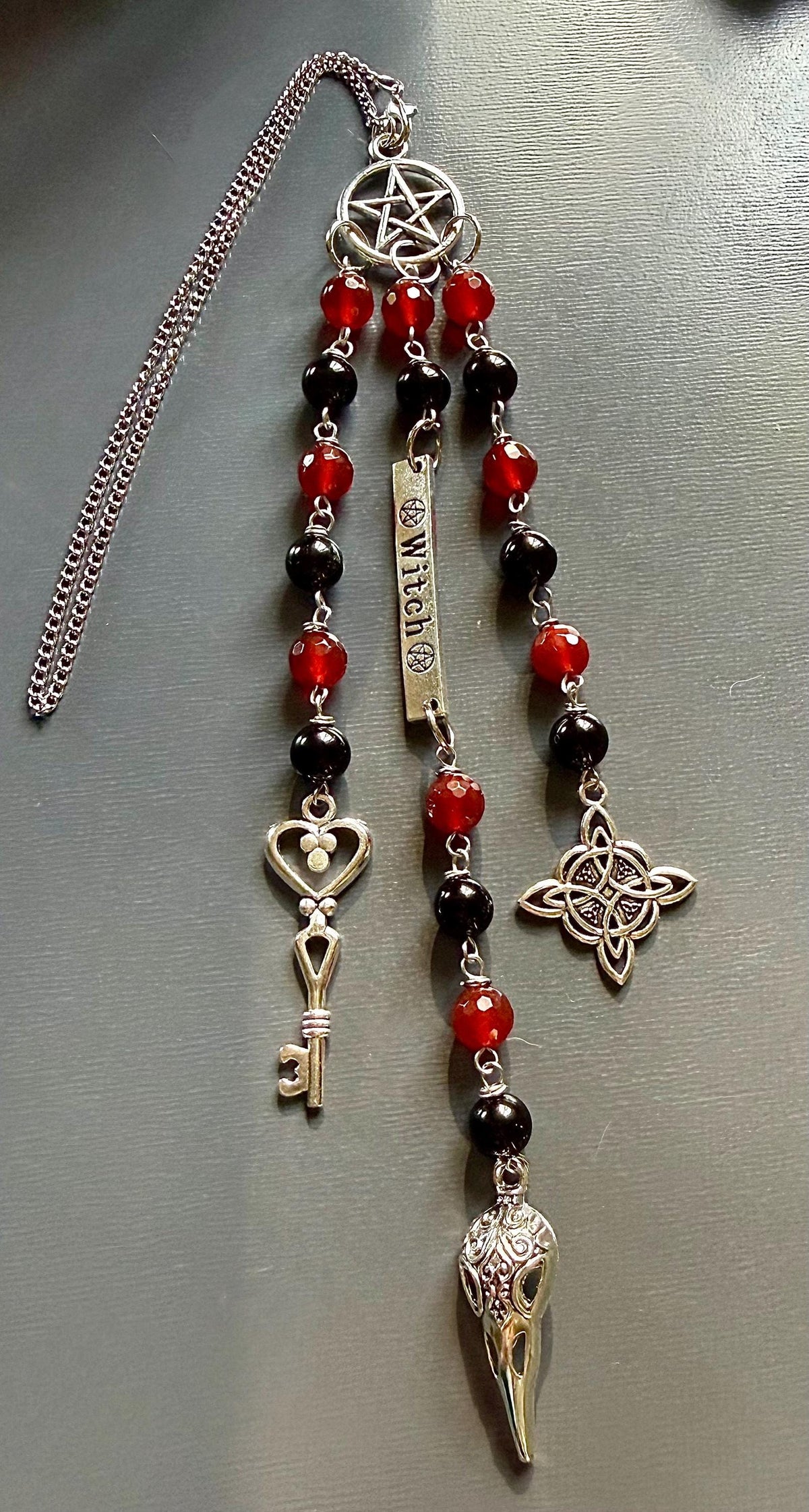 Witchy Car Charm Accessory:  Carnelian, Black Tourmaline Beads with Crow Skull, Witch’s Knot, and Key Charms.