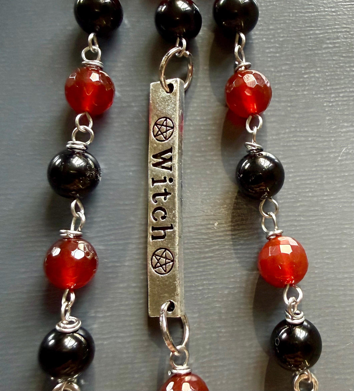 Witchy Car Charm Accessory:  Carnelian, Black Tourmaline Beads with Crow Skull, Witch’s Knot, and Key Charms.