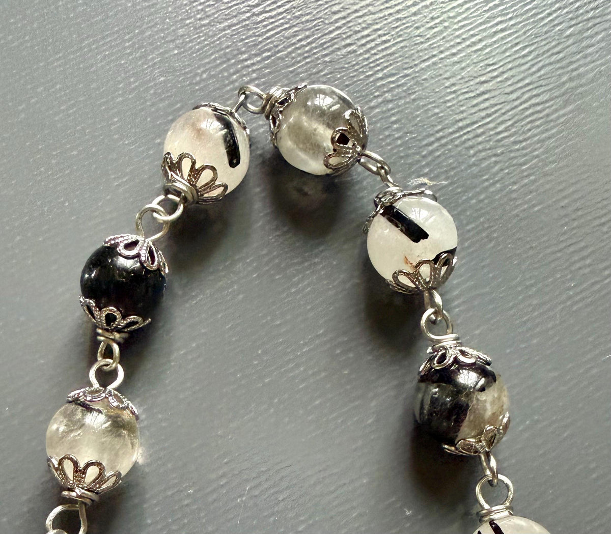 Handmade Tourmalated Quartz Pendulum with Triple Moon Charm.