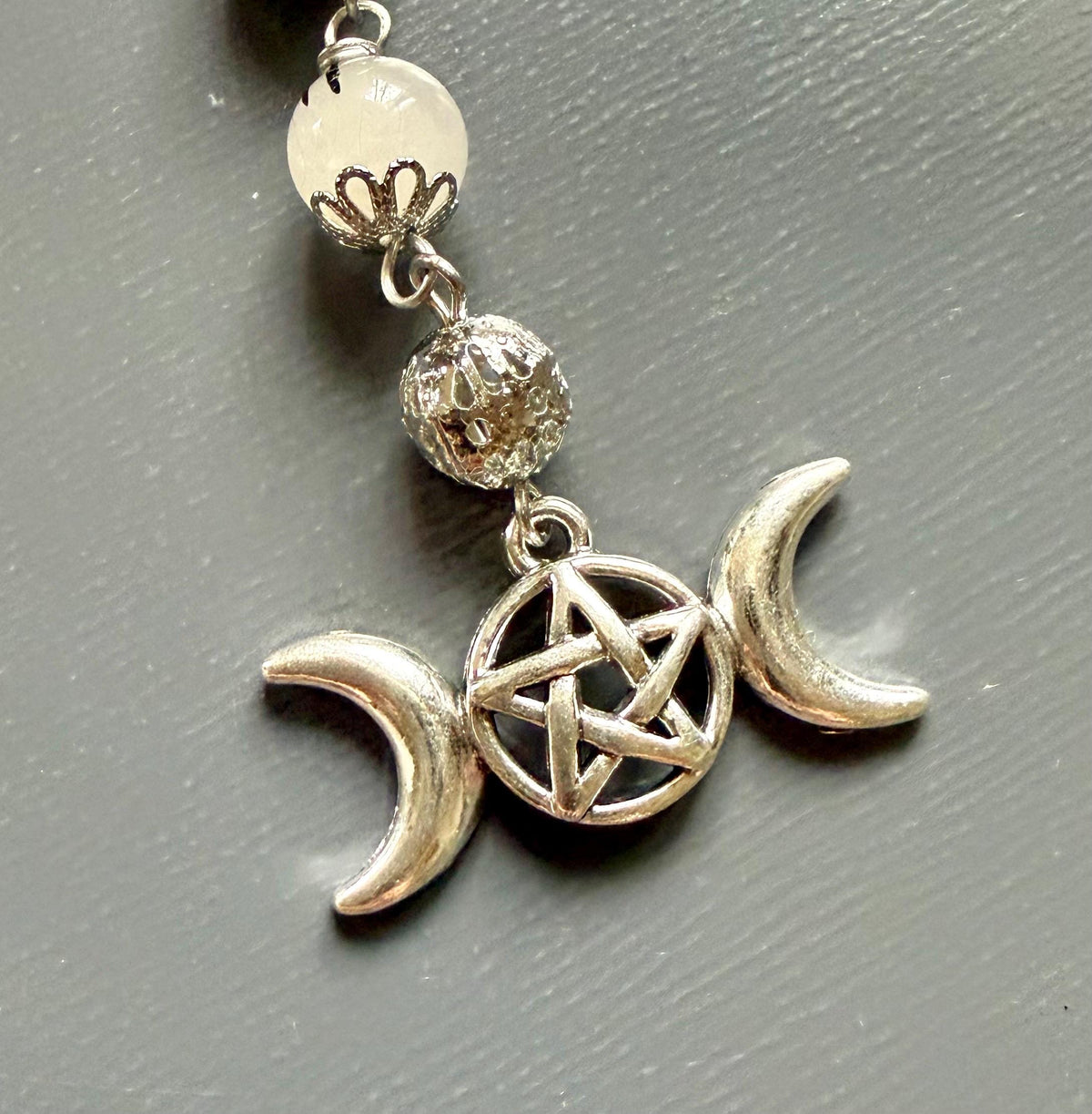 Handmade Tourmalated Quartz Pendulum with Triple Moon Charm.