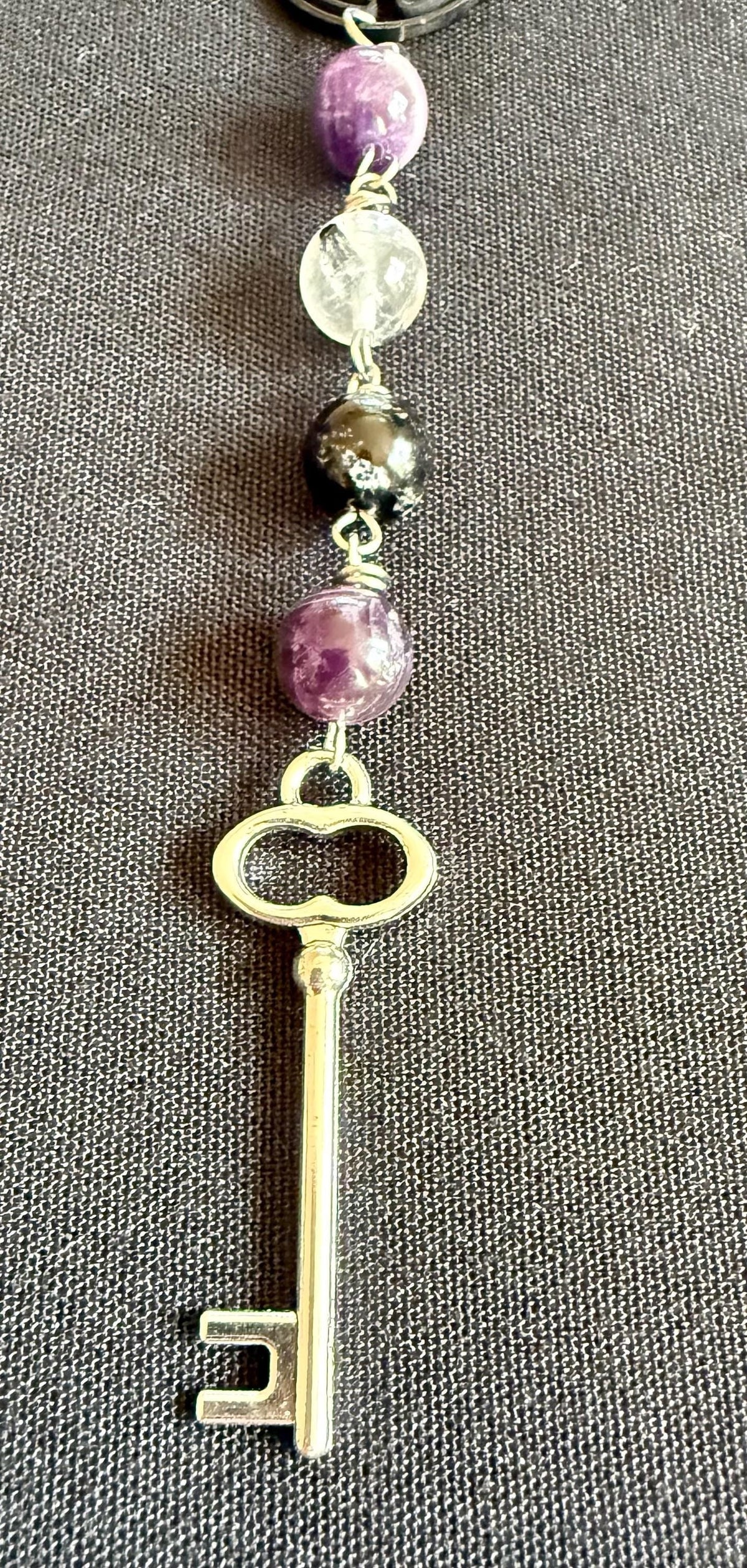 Goddess Hekate Devotional Altar Bundle with Altar Cloth, Witch’s Rosary, Pendulum , Black, and Purple Taper Candles.