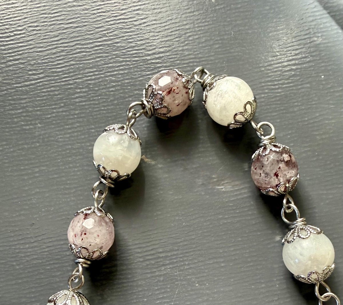 Handmade Lepidolite Point Pendulum with Strawberry Quartz and Moonstone Beads.
