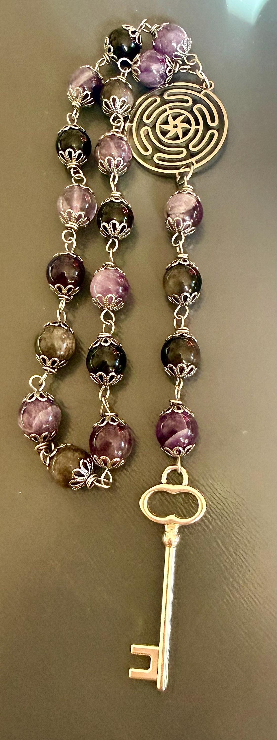 Hekate’s Wheel Strophalos Witches Rosary: Amethyst, Obsidian , and Key Charm.