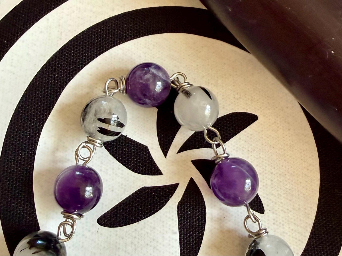 Goddess Hekate Devotional Altar Bundle with Altar Cloth, Witch’s Rosary, Pendulum , Black, and Purple Taper Candles.
