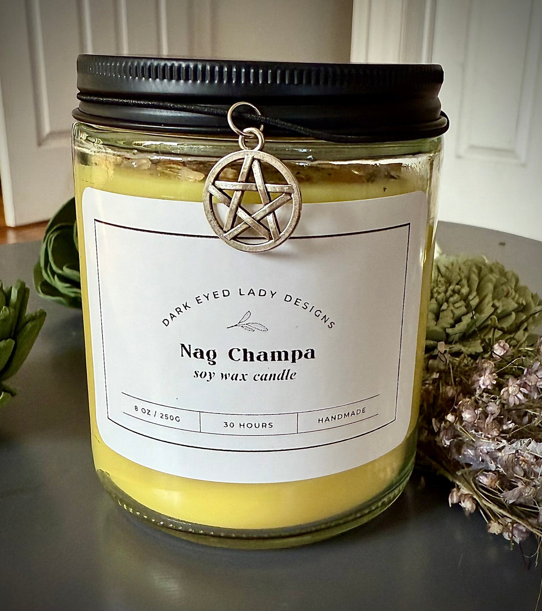 Nag Champa Blessing Candle with Herbs and Crystals.