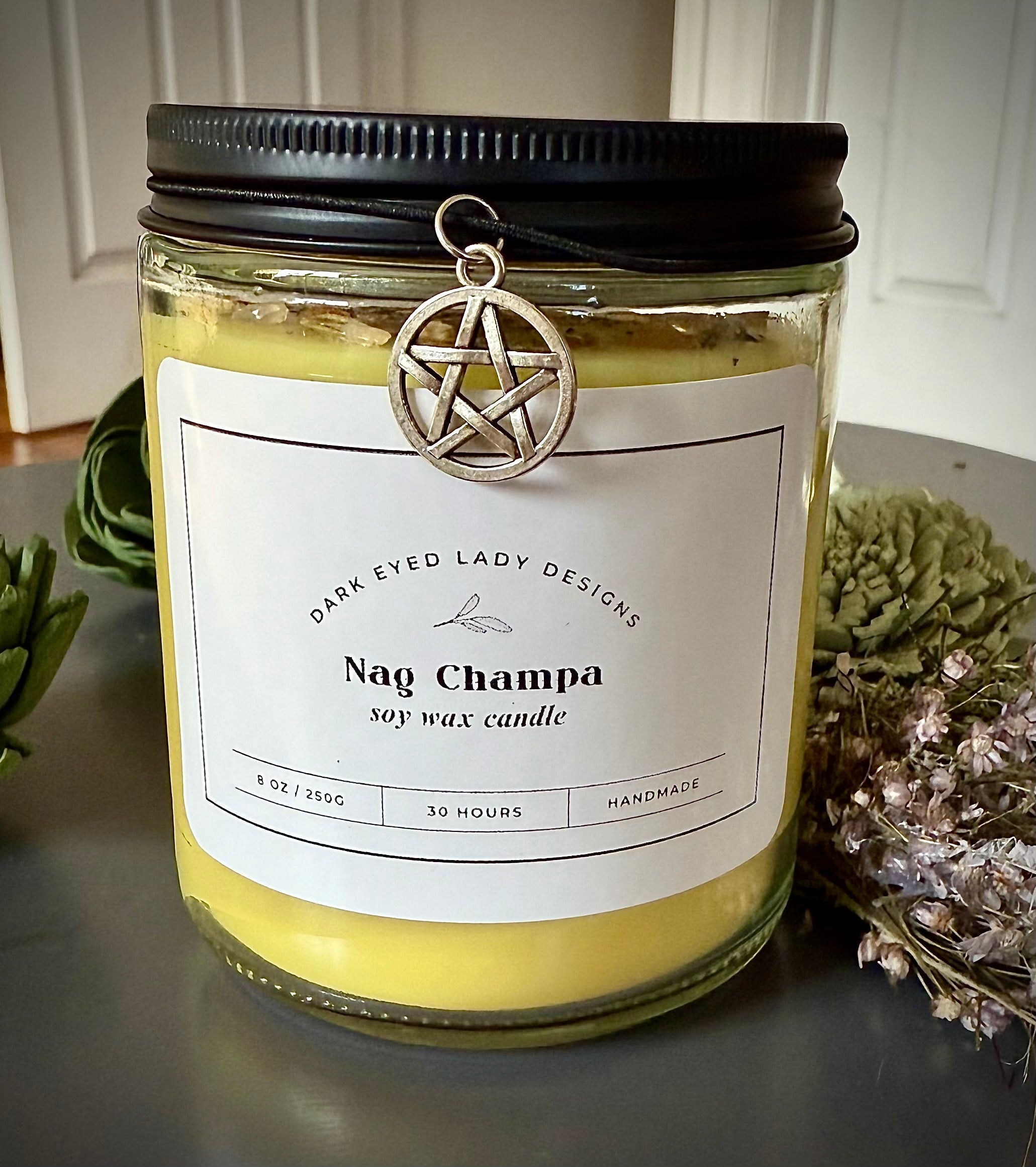 Nag Champa Blessing Candle with Herbs and Crystals.