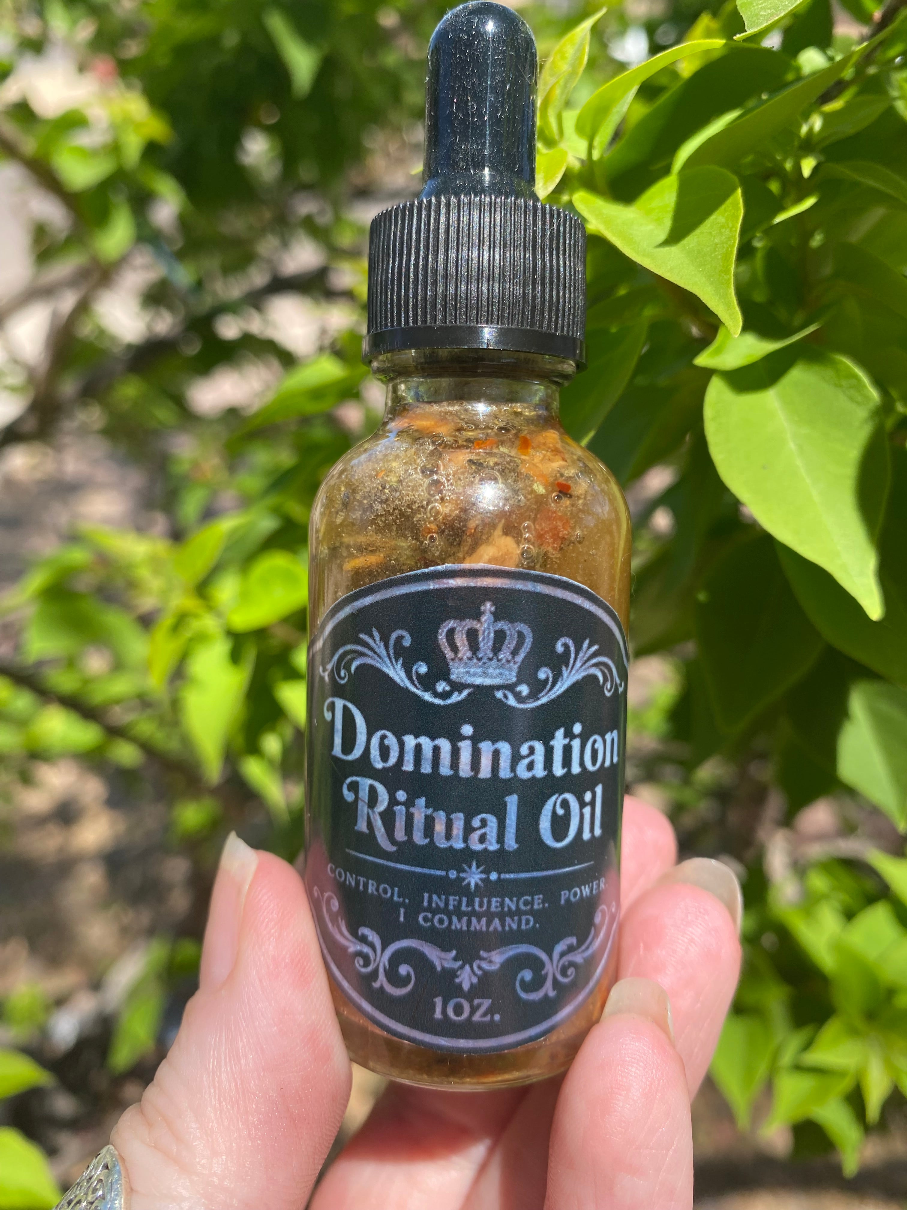 Domination ritual oil anointing