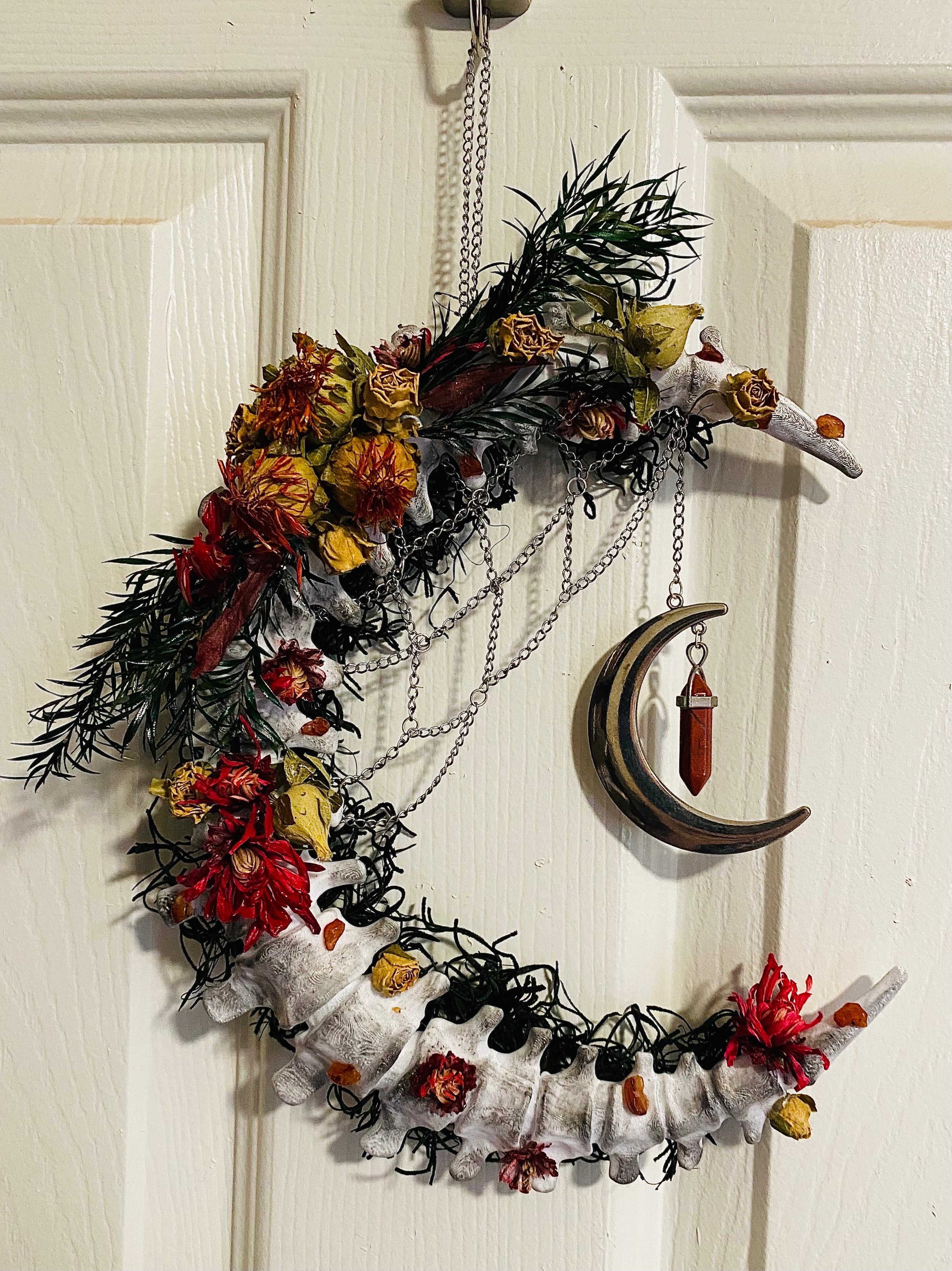 Floral crescent spine wreath
