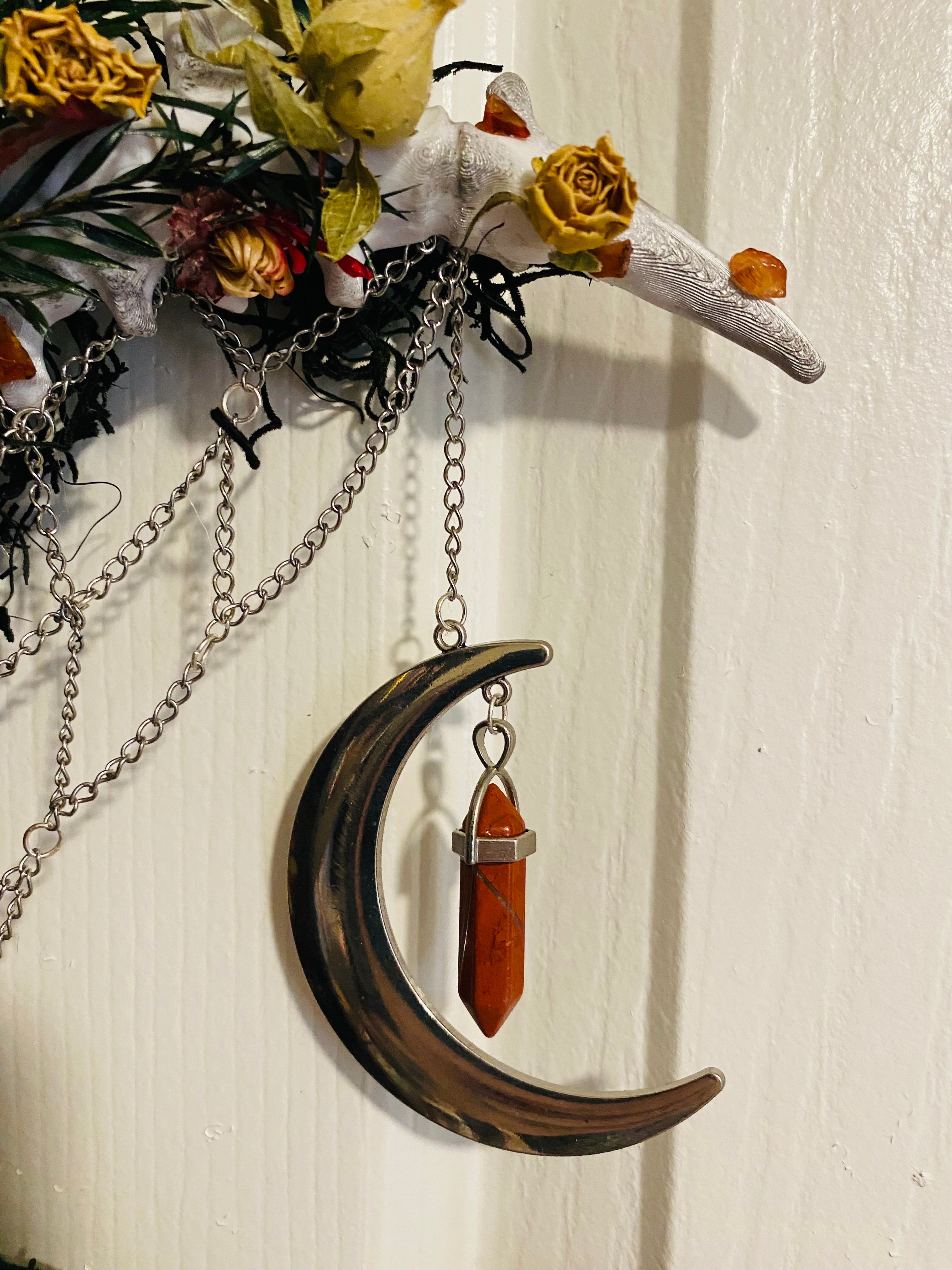 Floral crescent spine wreath