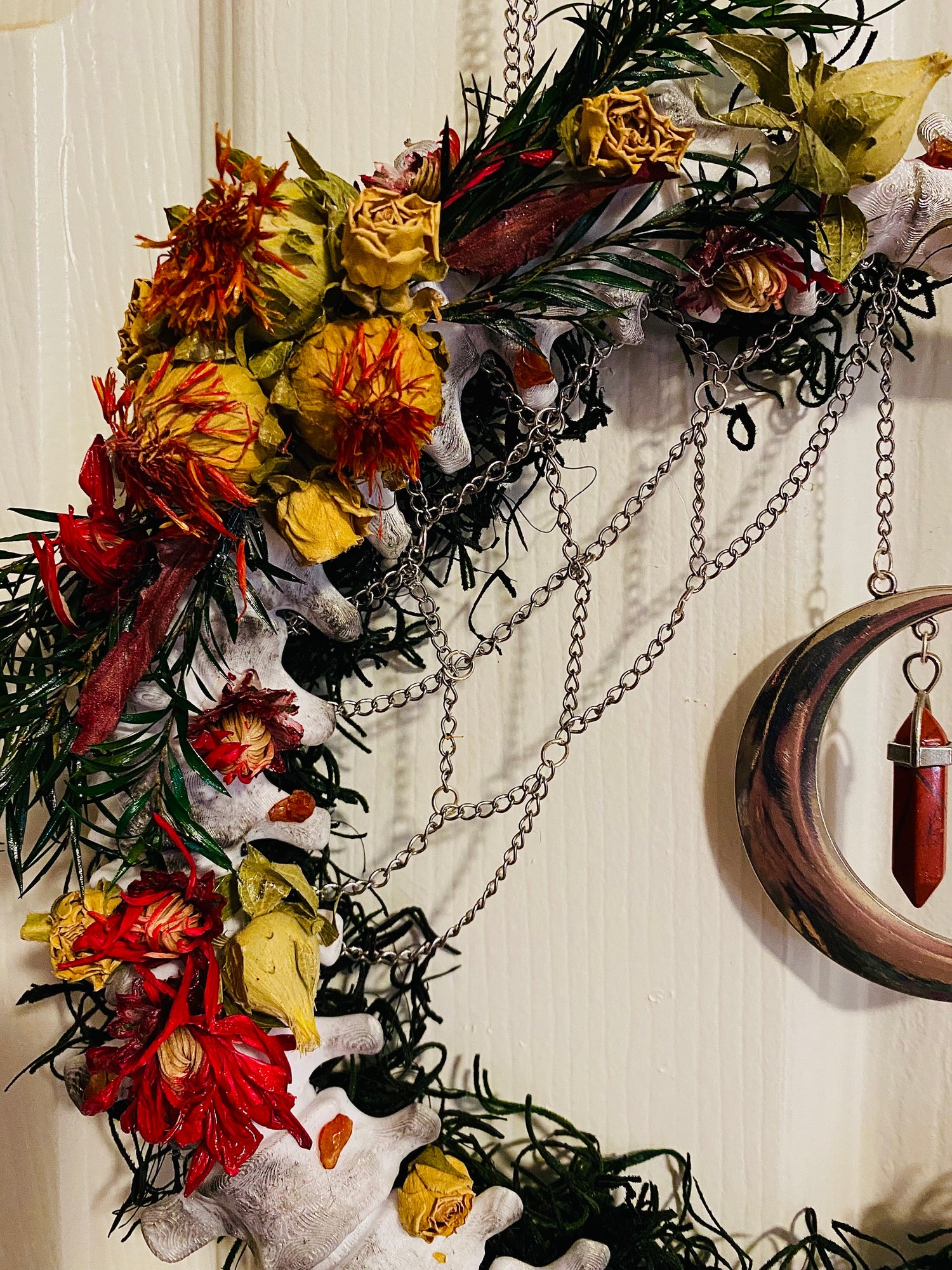 Floral crescent spine wreath