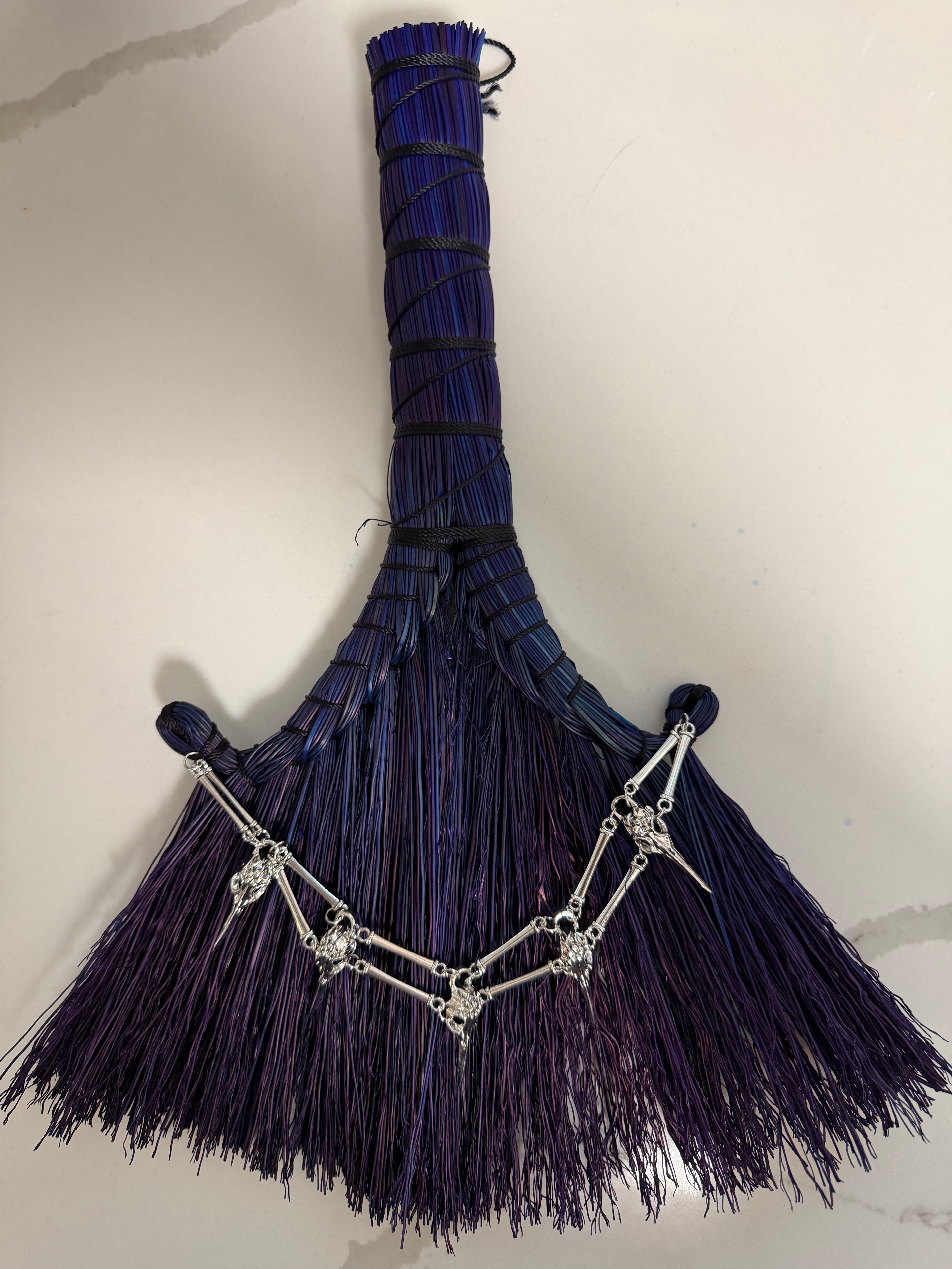 Raven broom