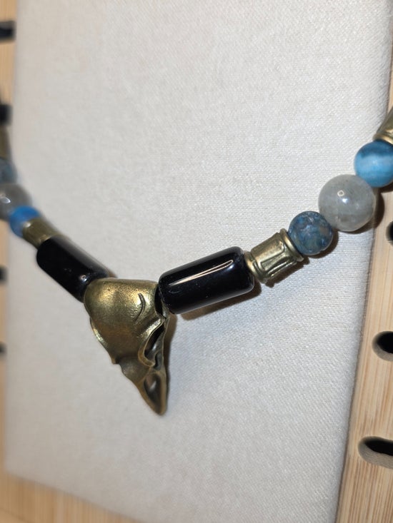 Antiqued Crow skull with Black Obsidian, Labradorite, and Larimar Blue Crazy Lace Agate on Leather Cord