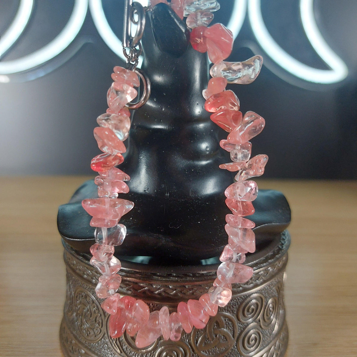 Pink strawberry quartz crystal chip bracelet with a silver stainless steel toggle clasp.