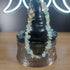 Amazonite crystal chip bracelet with stainless steel toggle, displayed on a decorative box.
