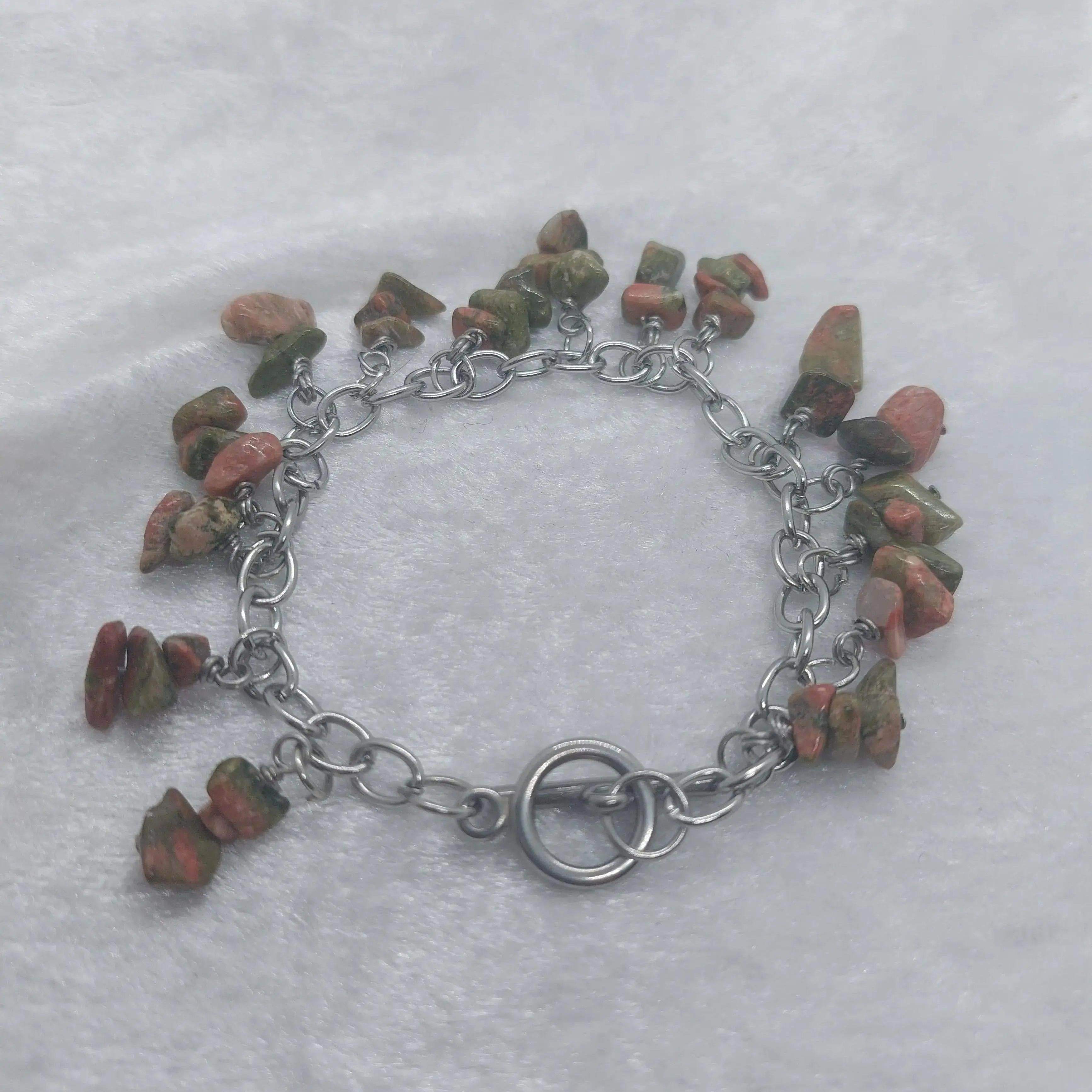 Unakite chip bracelet with green and pink stones on a stainless steel chain.