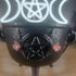 Pink rose quartz crystal beaded dangle earrings on a black cauldron with a Triple Moon pentacle symbol.