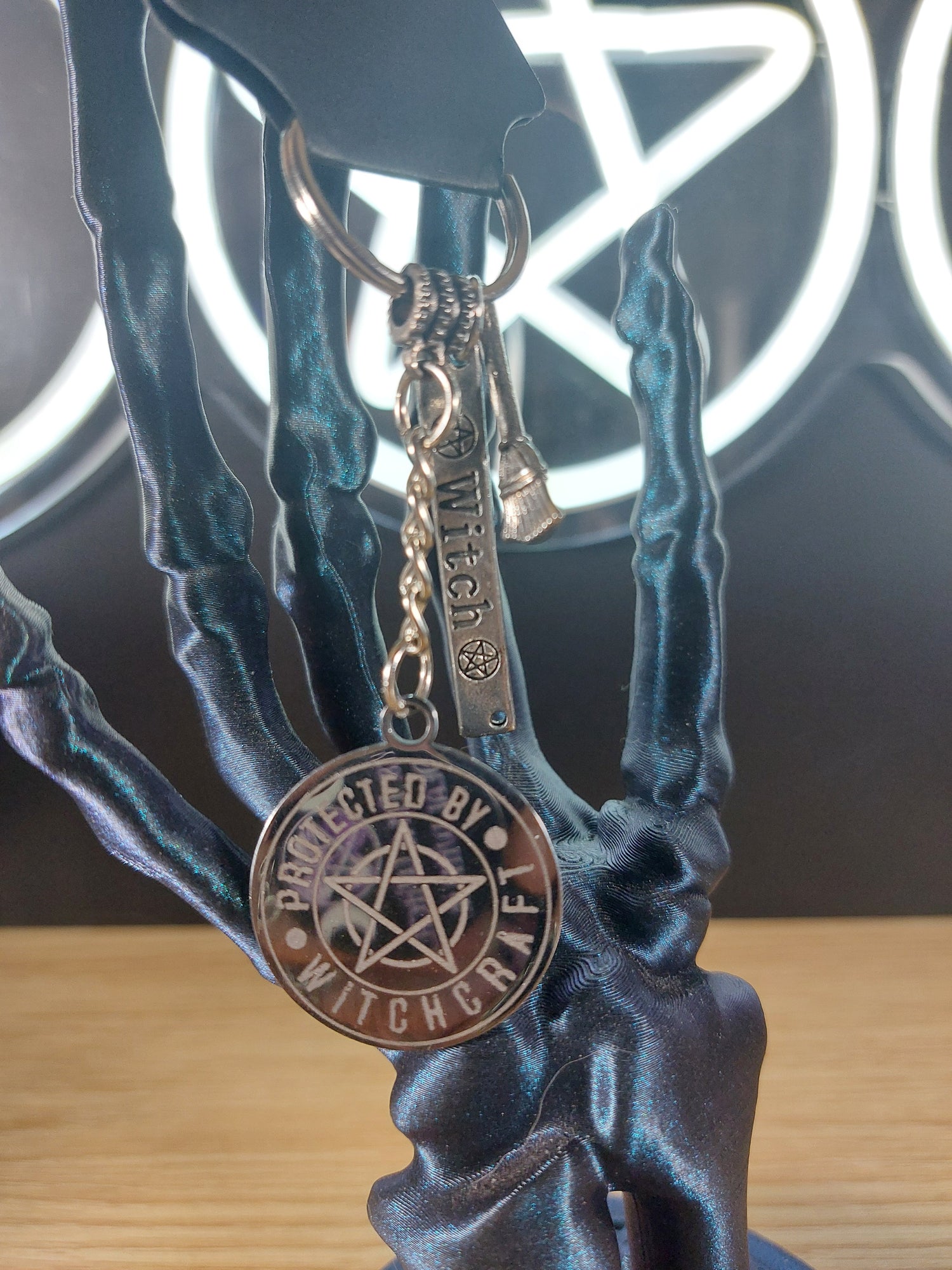 Silver Tone Protected By Witchcraft Medal with Charms Keychain