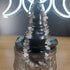 Smoky Quartz crystal chip bracelet with stainless steel toggle clasp, displayed on a black witch hat stand.